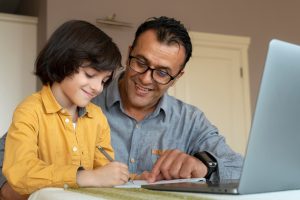 father helping his son online class 23 2149126697
