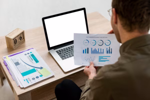 Blog 8 man working with infographics indoors 23 2148816826